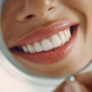 Closeup of a smile reflected in a mirror