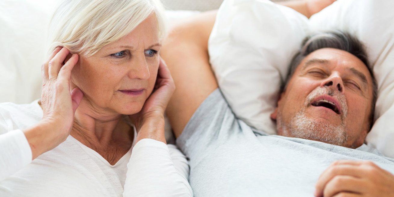 couple trying to sleep with sleep apnea in Burien