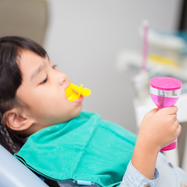 Patient receiving fluoride treatment