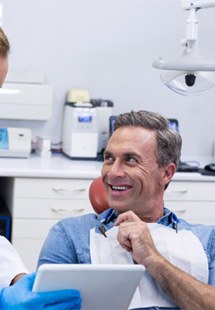 Man smiling in dental chair