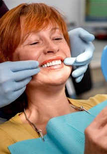 Woman smiling with dentures