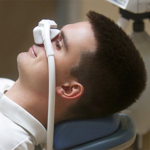 man relaxing with nitrous oxide dental sedation in Burien  