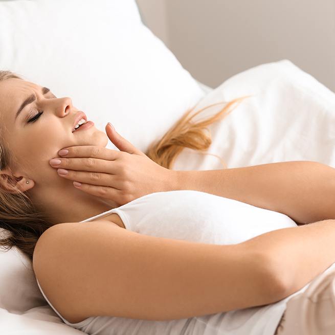 Woman with tooth pain