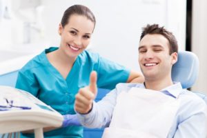 man getting a dental checkup in the new year