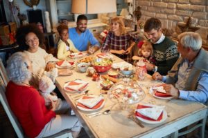 family and friends celebrating during the holidays