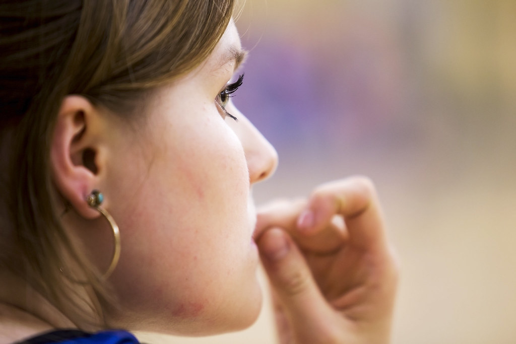 person biting their nails