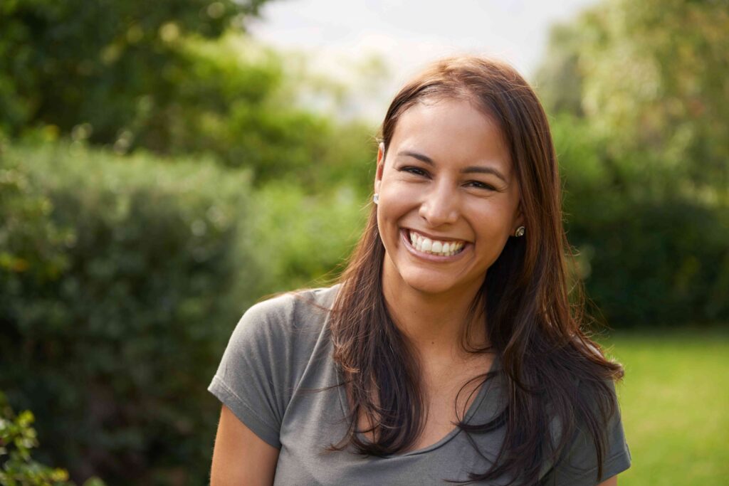 Woman smiling outside